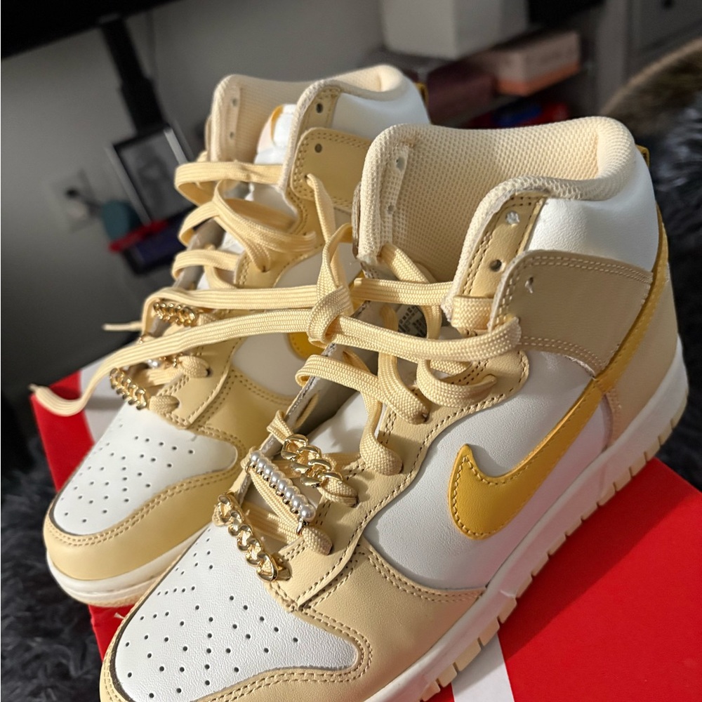 Nike Yellow and White High-Top Sneakers with Bold Swoosh